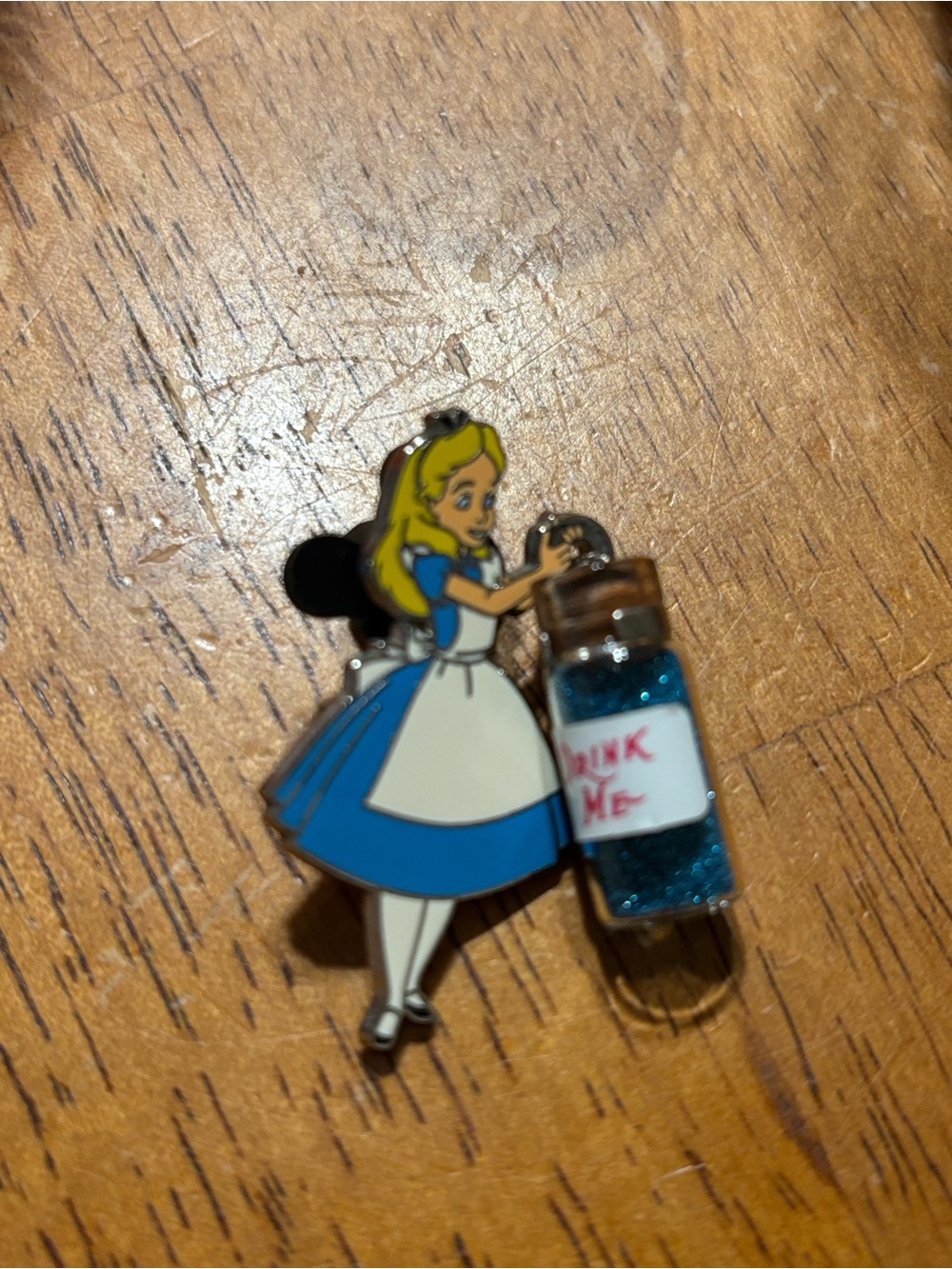 Collectors Disney Alice in Wonderland Enamel Pin with Glitter 'Drink Me' Bottle